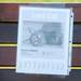 A sign looking for Apricot, a cat last seen before last Thursday's tornado, is posted on a bench in the Huron Farms subdivision in Dexter on Monday. Melanie Maxwell I AnnArbor.com